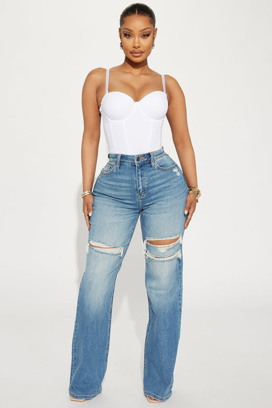 Remi Ripped Stretch Baggy Jeans - Medium Wash.