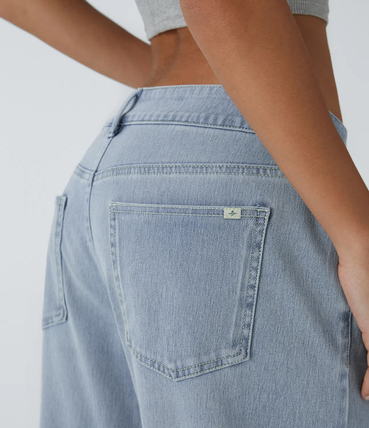 Halara Flex™ Low-rise, asymmetrical wide-leg jeans with a button
